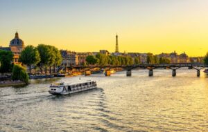 Sunset view of Eiffel tower, Pont des Arts and Seine river in Paris