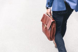 Worker holding a briefcase