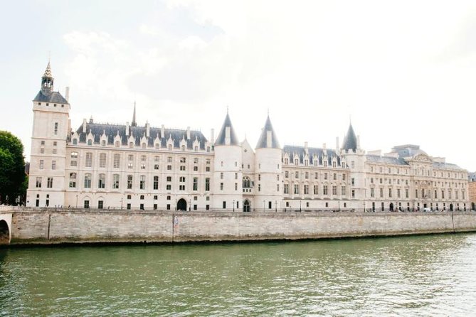 History of Paris Walking Tour with Notre Dame, Latin Quarter, and Île de la Cité with a view of the castle and river.