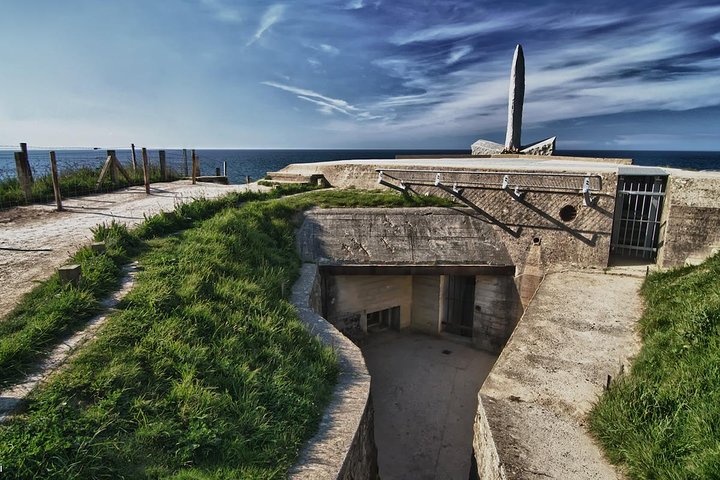 Normandy D-Day Landing Beaches Guided Tour from Paris with a view of a bunker