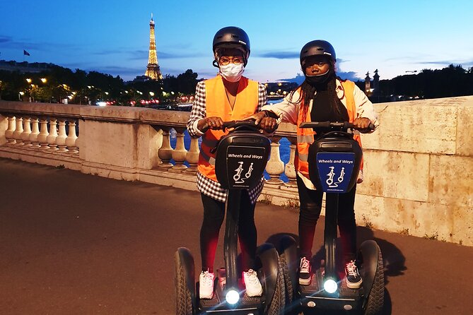 Segway by night ! Illuminated Paris Review with Group Tour.