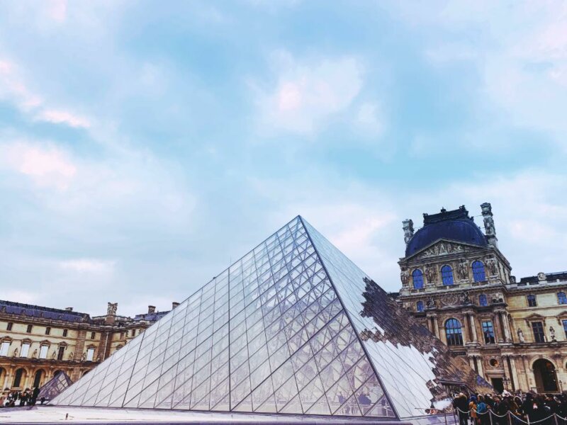 Louvre Glass Pyramid sitting in front of the museum