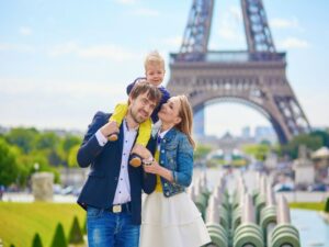 Happy family at Eiffel Tower in Paris