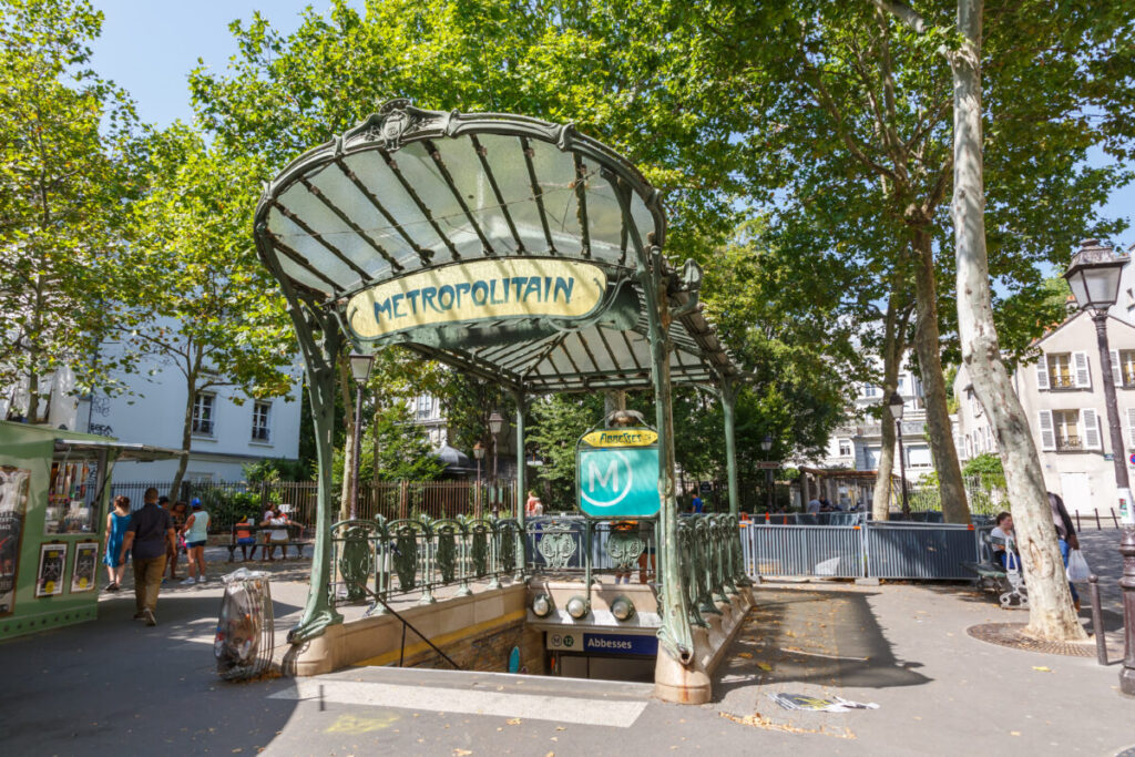 2019 photo of Abbesses Metros Art Nouveau entrance by Hector Guimard in Paris, France.