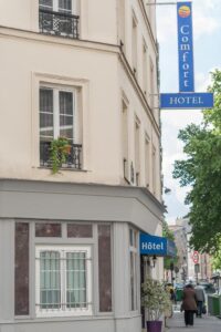 Comfort Hotel Nation Père Lachaise features a classic facade