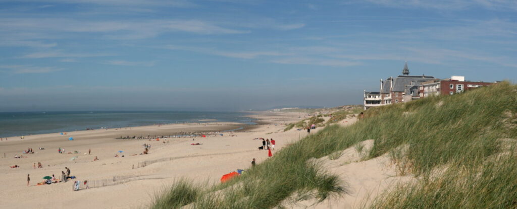 The beach at Berck-sur-Mer, France, offers a delightful coastal retreat with its expansive sandy shores and refreshing sea breeze.