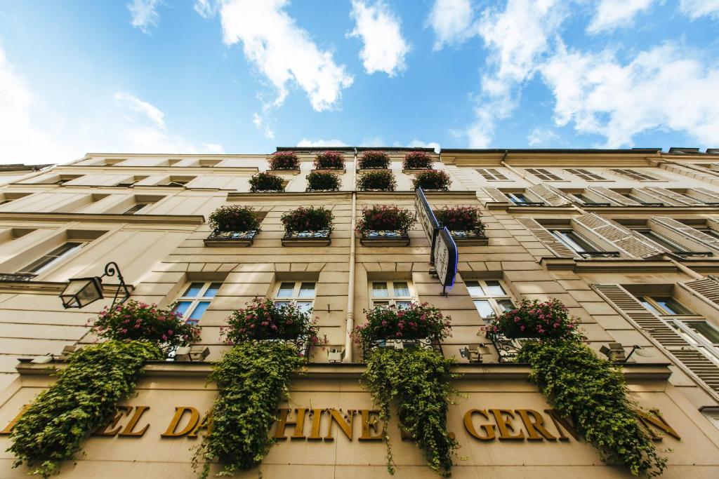 Dauphine Saint Germain captures attention with its charming exterior and inviting entrance, promising a classic and delightful stay in the heart of Saint-Germain-des-Prés.