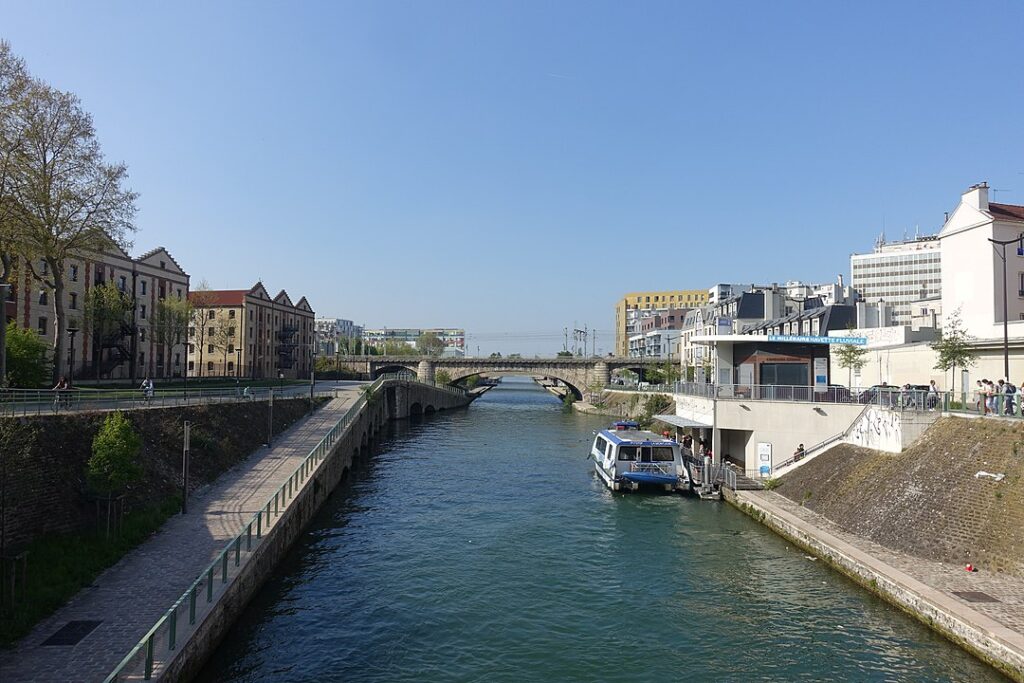 Boat cruising at Canal Saint-Denis, Paris, France