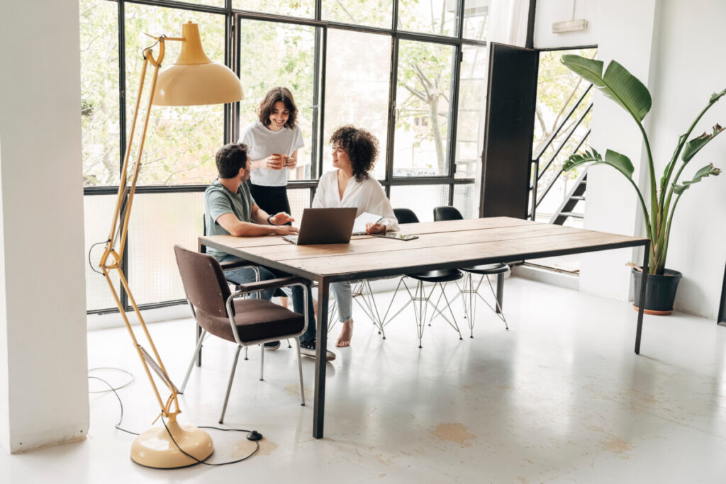 Group talking and sharing a coworking space