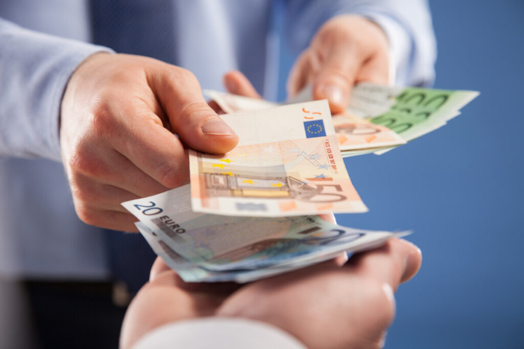 Hands money exchange to Euro paper bills