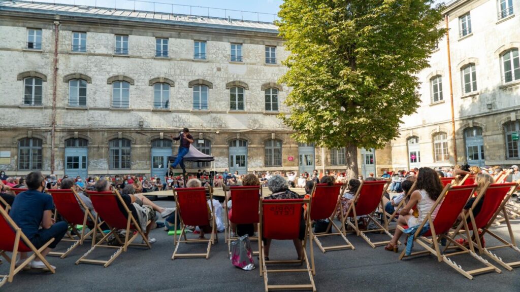 Crowd watching a performance during the Festival Paris l'été in Paris, France