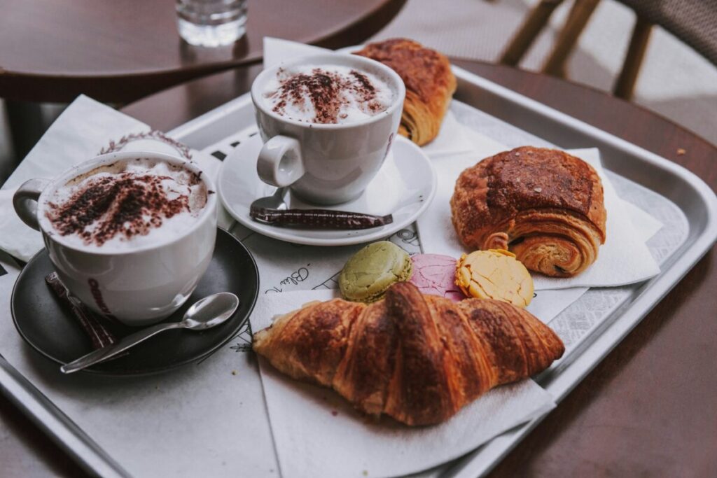 French two cups of coffee and croissant