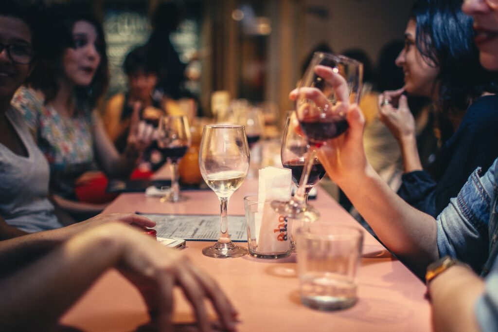 Group drinking wine together