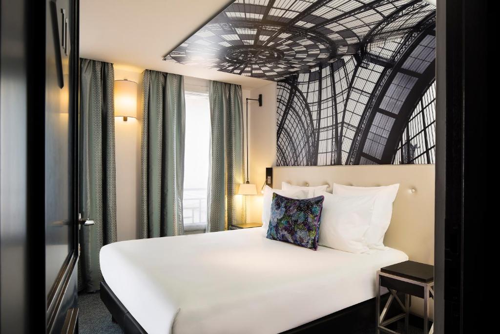 Hôtel Gustave Paris Bedroom: Escape into a realm of comfort and sophistication within our meticulously designed guest rooms.