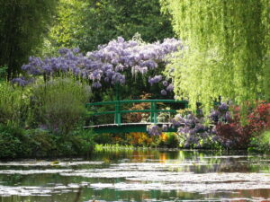 Tree Bridge and Japanese lake at Monet Garden in Giverny Normandy France