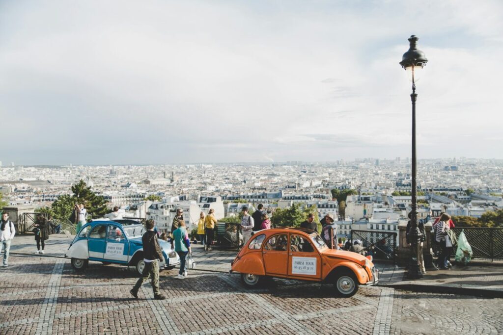 Tourists and top hill view in Montmartre, Paris, France