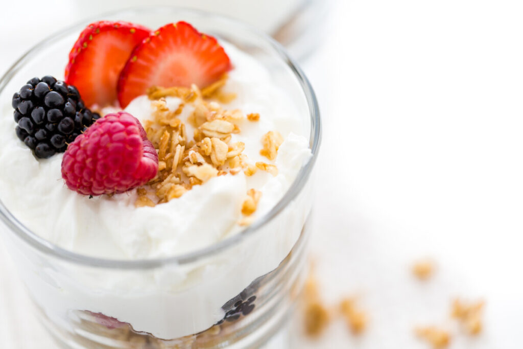 Parfait made of yogurt, granola, and fresh berry